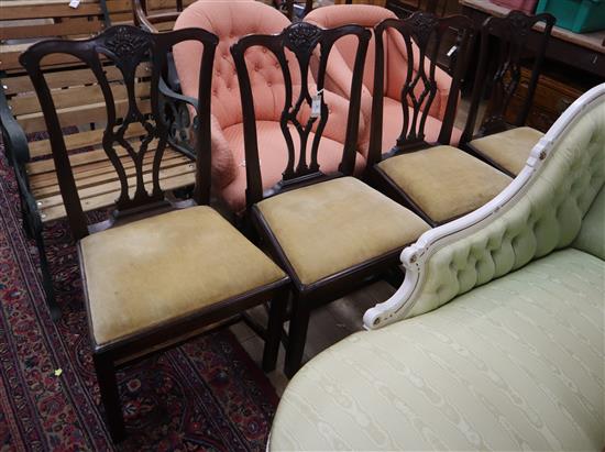 A set of four George III Chippendale style mahogany dining chairs